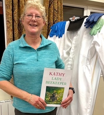 Kathy creates a buzz at WI meeting