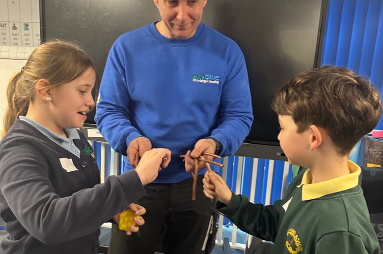 Learning about heating and plumbing with Paul Screen.