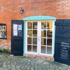 Art exhibition opening event in Newent
