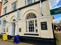 Duo charged with burgling Marches Deli