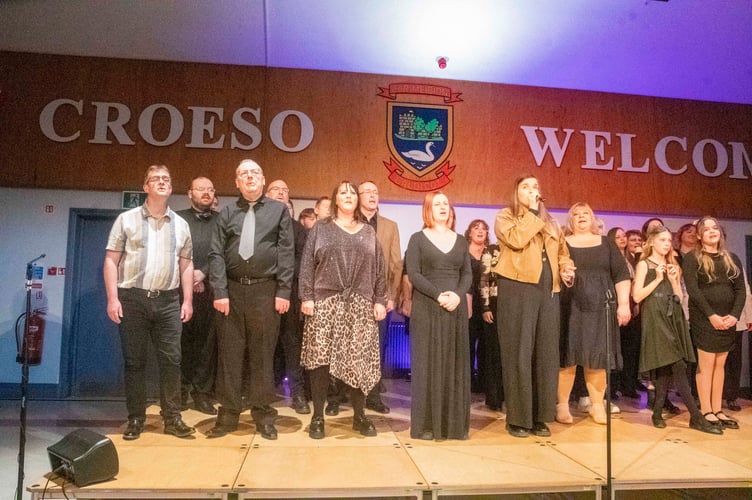 Naomi Coleman leads the ensemble in the final song of thhe show, The Color Purple.
