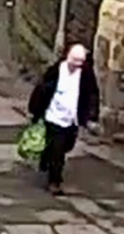 A CCTV still of the man police want to talk to near Wye Bridge