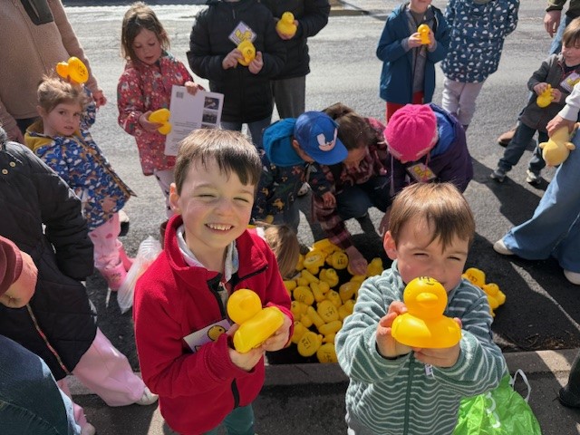 Two brothers with their ducks.