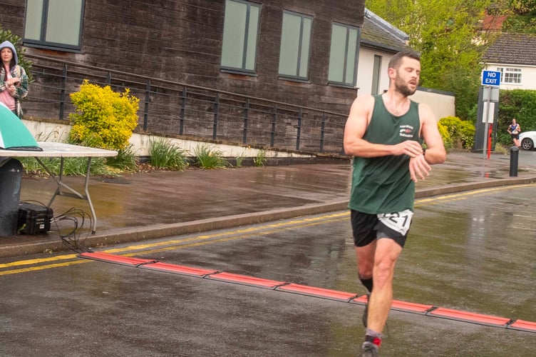 Conor McLeish of Monross Trailblazers crosses the line.