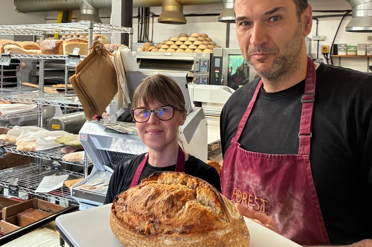 Forest Bakehouse Bakers Chris Hill and Craig Fishpool with the Gloucester History Festival loaf.