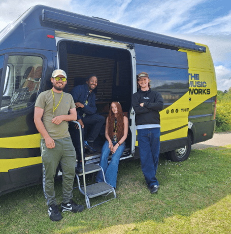 The Music Works team with the Music Bus at Lydney Skatepark Carpark, where weekly music sessions are taking place every Thursday.