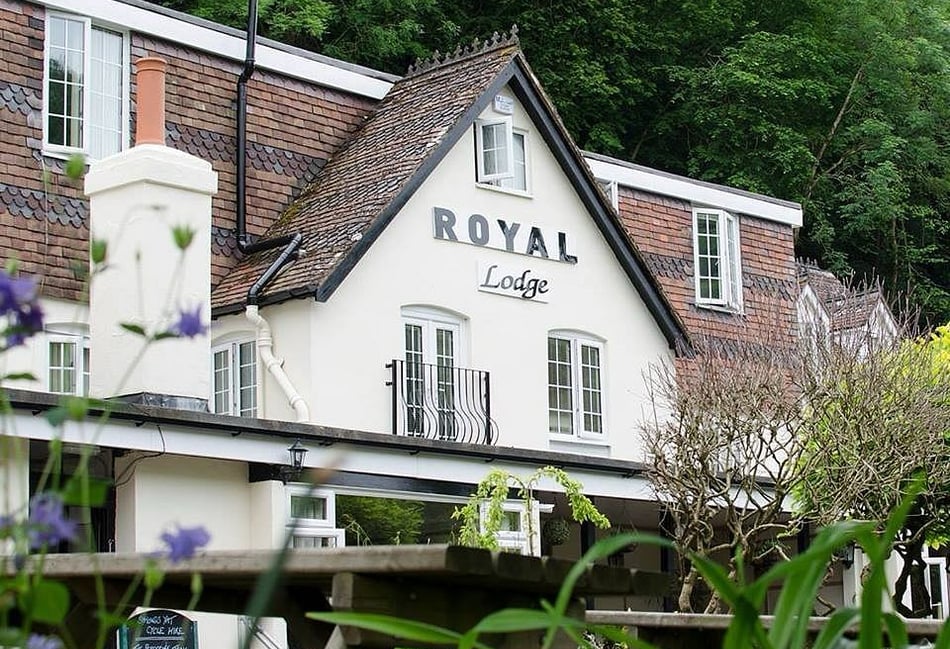 Riverside hotel hit by falling boulder from rock face