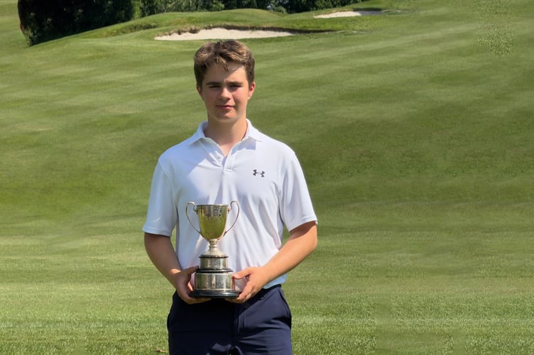 Toby Tarp won the best nett trophy on his first visit to Knowle Golf Club.