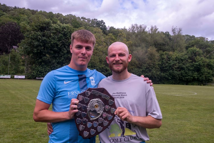 Broadwell goal scorers Kris Burnard (left) and OJ Etheridge with the trophy.