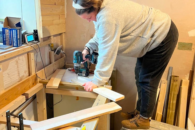 Sam Wilkins at work during the renovation