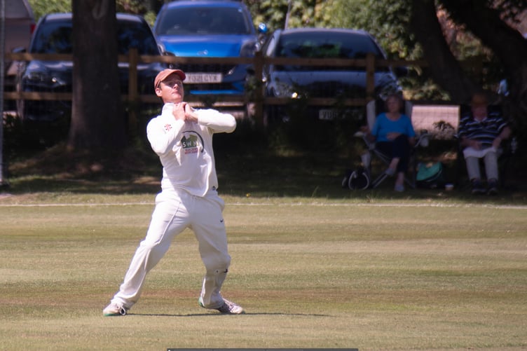 Dave Kear takes a catch to end Robbie Jones's innings.
