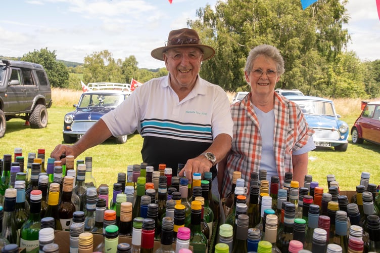 Alan and Jan Robinson on the water or wine stall.