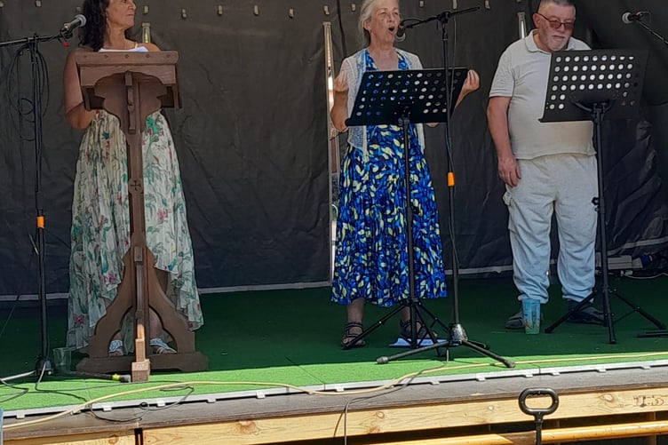 The leadership of Newland Parish Council—Chair David Wheeler and Vice-Chair June Davies—stepped forward to root the day’s mythology and folklore into a historic declaration of modern stewardship.
