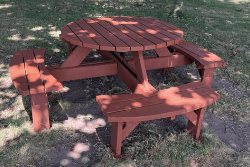 One of the restored round picnic benches at Sling Playing Fields, designed to offer easier access for people with mobility issues.