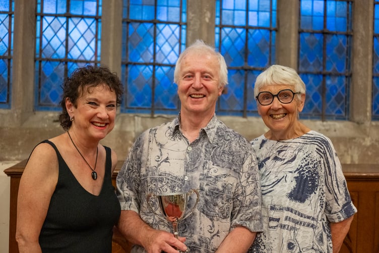 Di Brice (right) presents the Dick Brice Song Writing Award to Ian Harvey and Jan Vaisey. Picture: Eden Tanner.