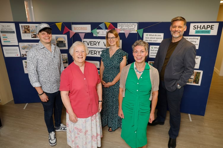 Chris Brown, left, Chief Executive Officer of the Forest Voluntary Action Forum (FVAF), Jacky Edwards, of the All Pulling Together (APT) Community Association, Lisa Wilson of GL11, Debs Cook of FVAF, and David Owen, chair' of The Summerfield Charitable Trust.