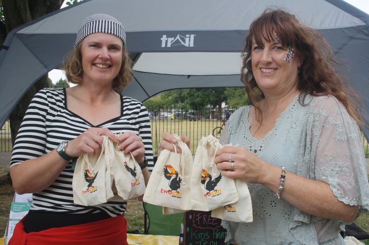 Leanne Bufffin and Anthea Tawney of Two Rivers Housing with prizes for a pirate-themed treasure hunt.