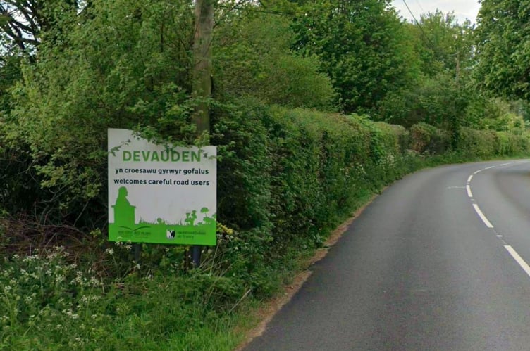 A farmer wants to site a large storage barn near woodland on his Devauden farm