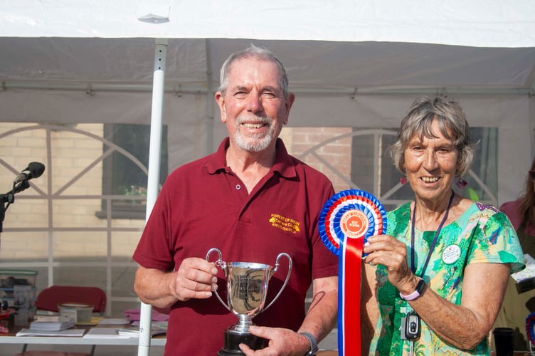 A picture of St Anthony's Well, Littledean won Forest of Dean Camera Club member Tom Dunbar the best in show cup for non-horticultural exhibits.