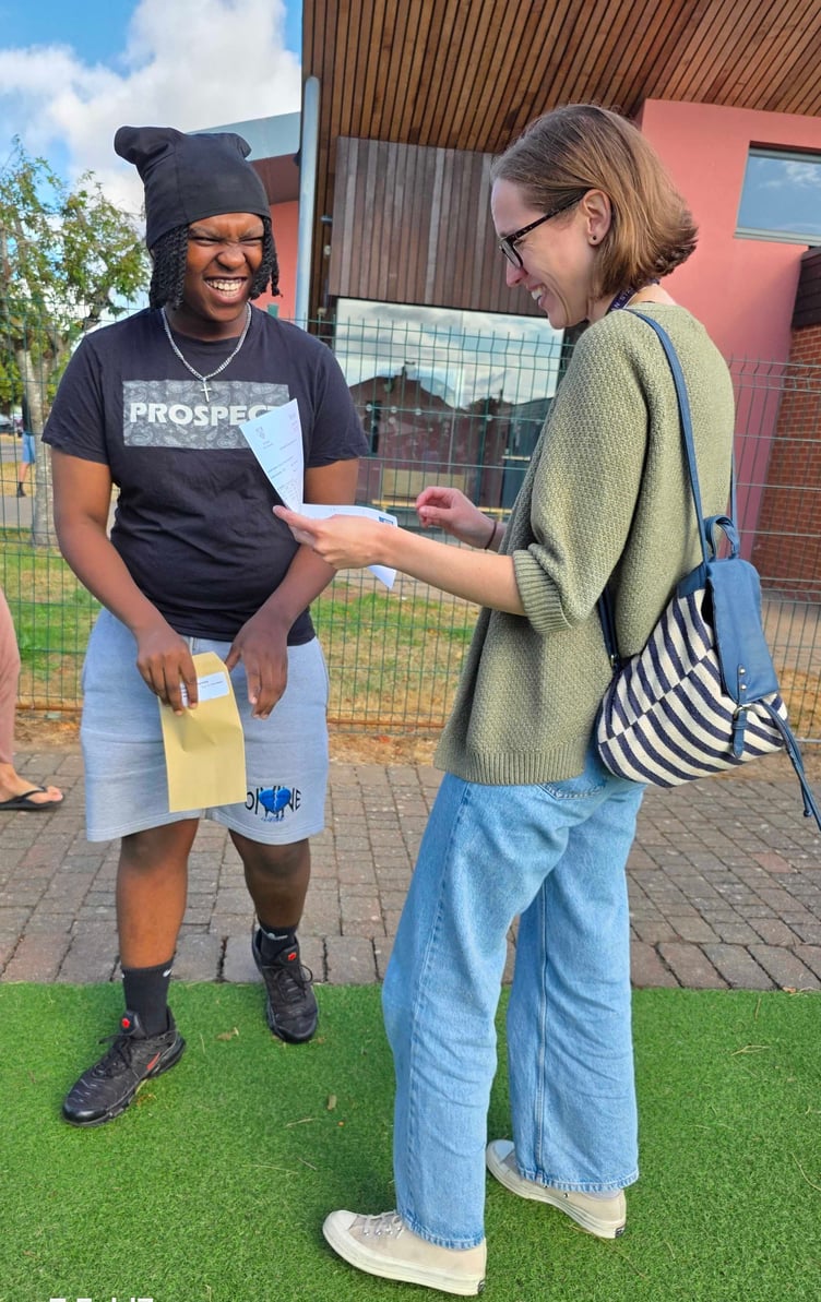 Charles Mariwande and Mrs Briggs delighted with results