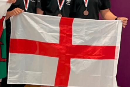 Charlie Bowden celebrates with his England team mates