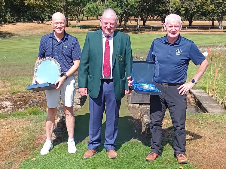 Gross winner Mark Barnard, Seniors' Captain Kev Doyle, and Nett winner Mike Connon with their John Barton Salvers.