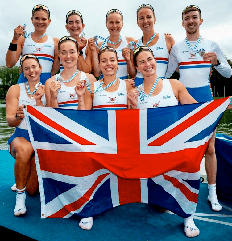 Jack Tottem, back far right, celebrates world silver in Amsterdam with the GB women's 8