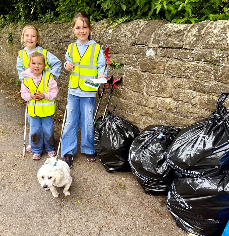 Nancy, Tess and Rose Geoghagen with some of the litter they removed from around Lydney.